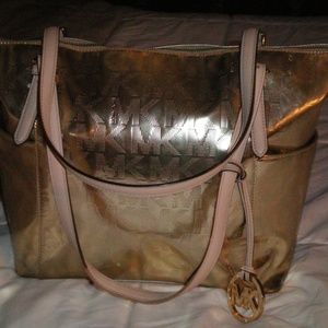 Michael Kors GOLD Signature hand Bag.